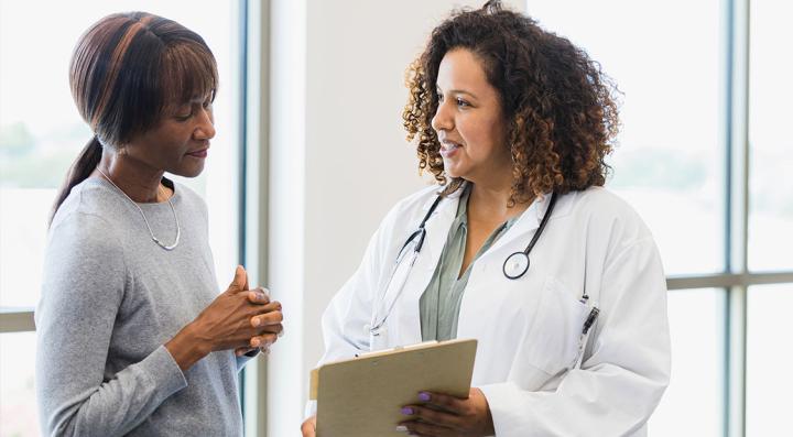 patient and physician discussing treatment plan